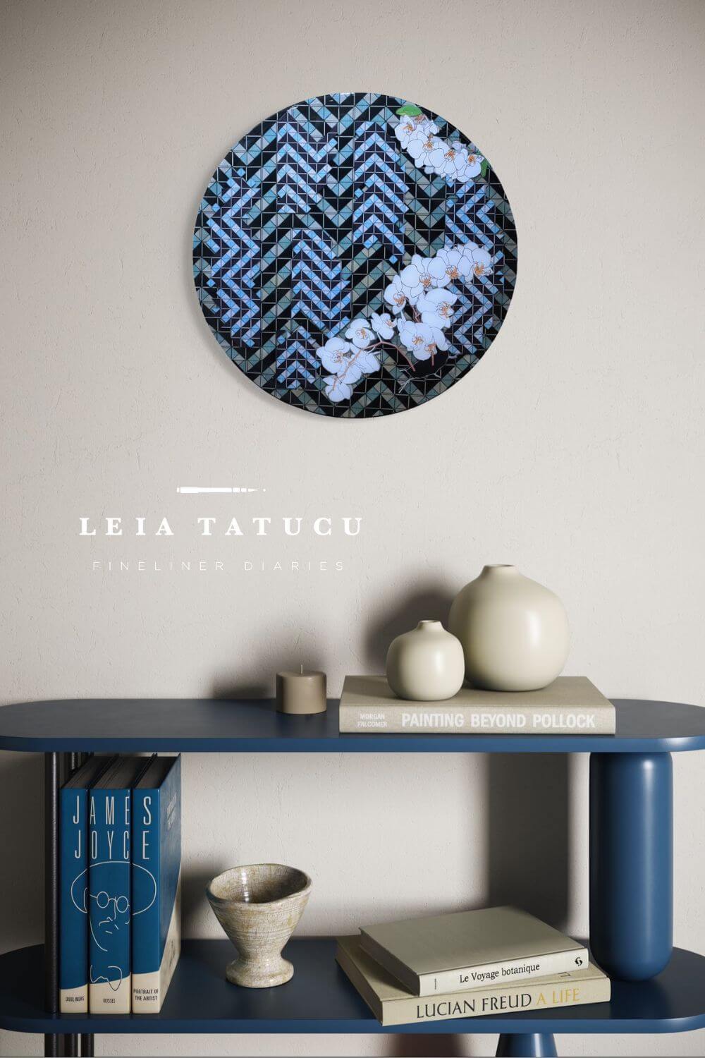 Decorative wall piece with blue and black pattern - Breaking Patterns II artwork by Leia Tatucu - on a shelf with books and vases.