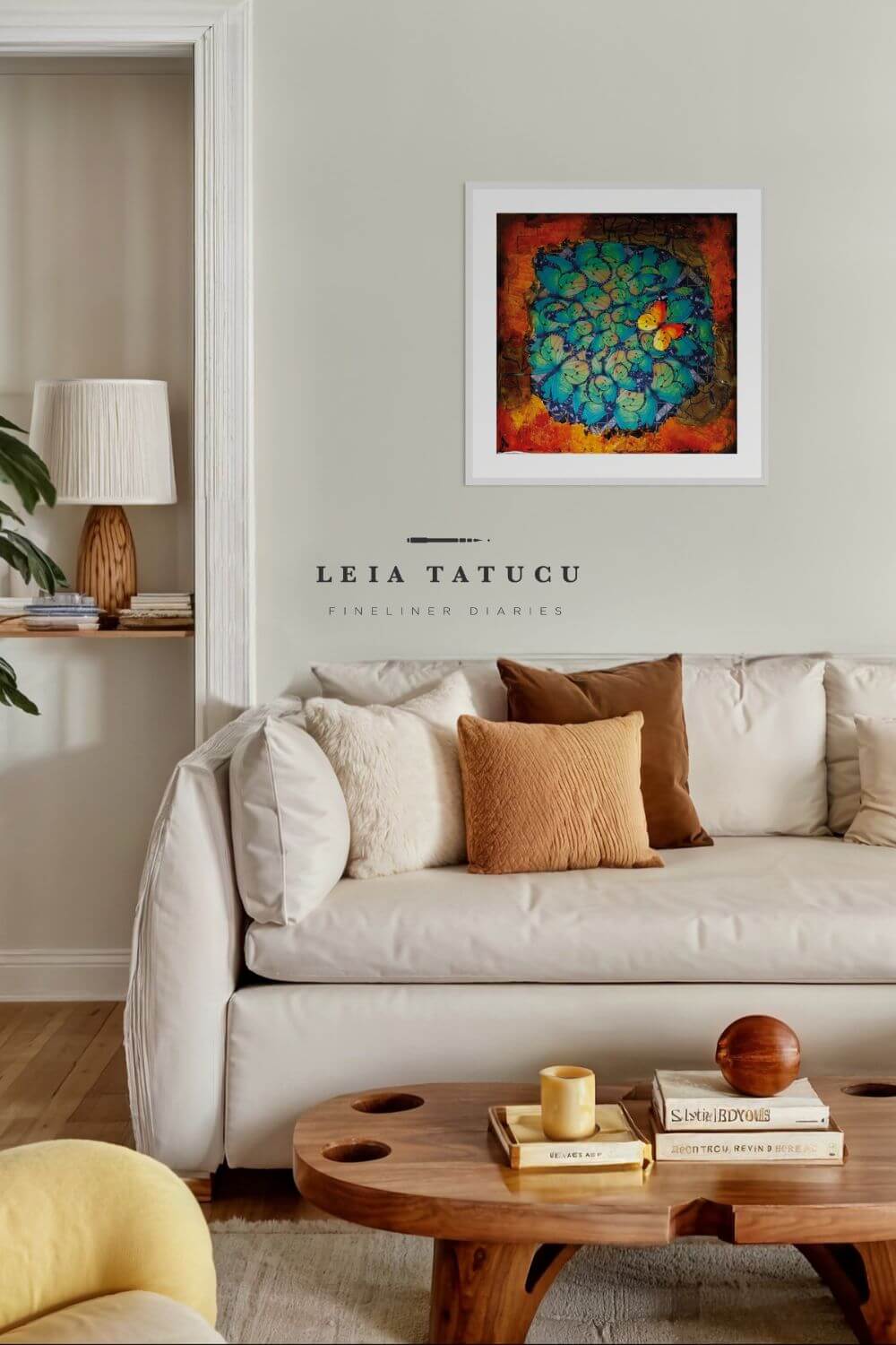 Living room showcasing a colorful art print by Leia Tatucu above a cozy sofa with decorative cushions and a stylish coffee table.