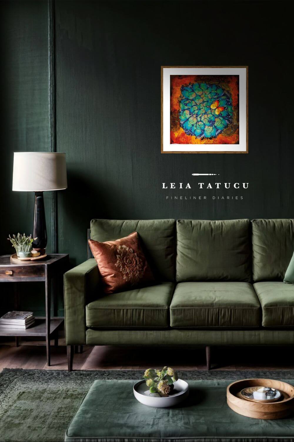 Stylish living room featuring green sofa, decorative pillow, and vibrant art print by Leia Tatucu on dark green wall.