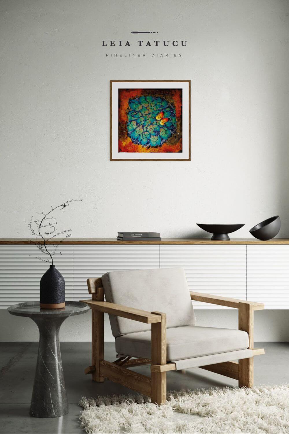 Modern interior featuring Leia Tatucu's Diferente fine art print above a cozy armchair and minimalist decor.