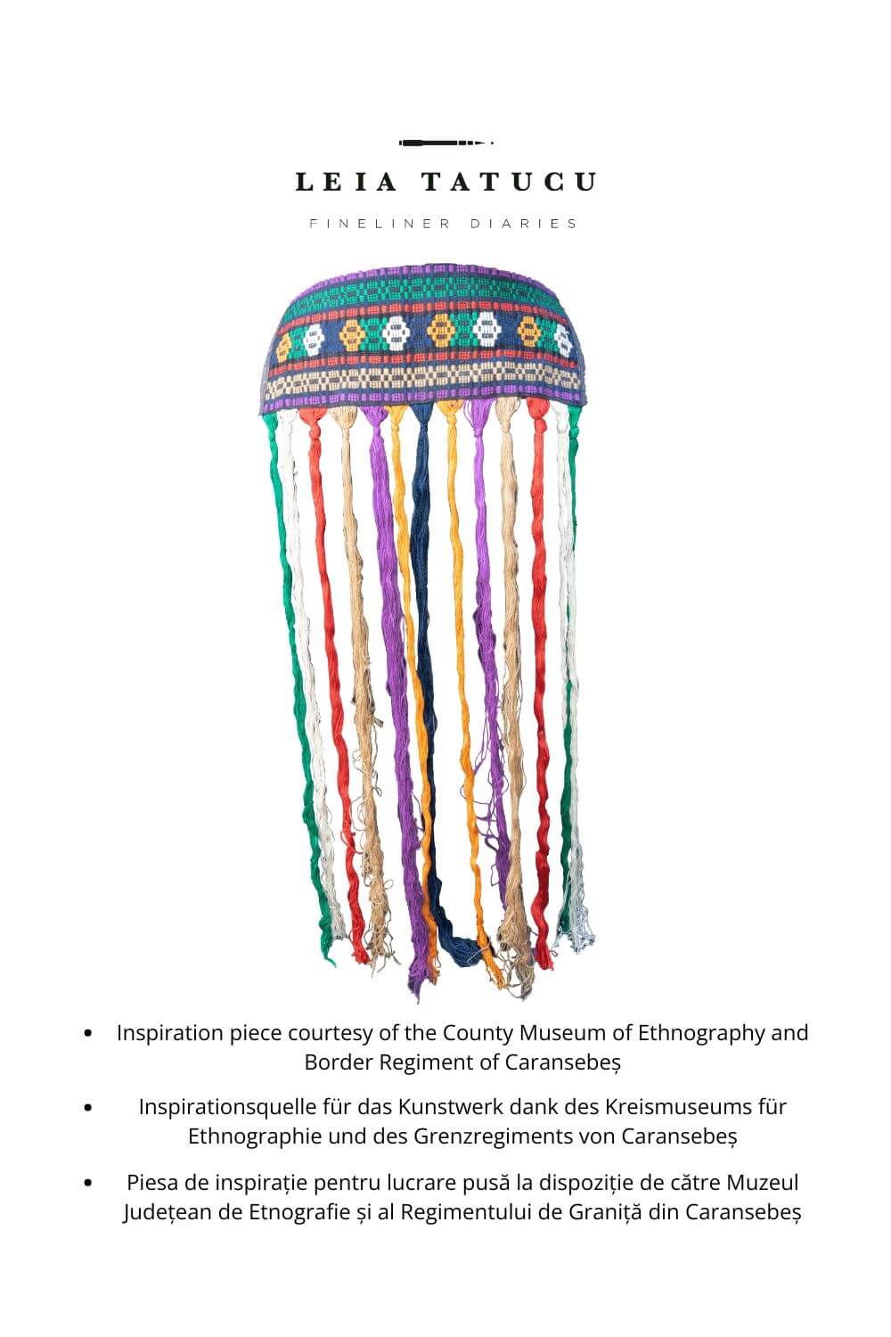 Colorful traditional apron inspired by Romanian traditional designs, featuring decorative fringes and geometric patterns.