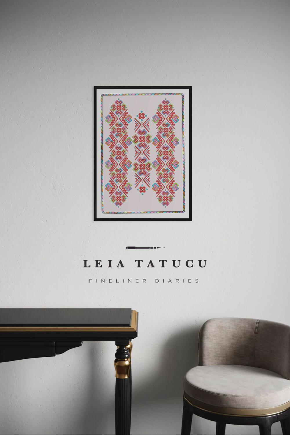 Geometric motif artwork by Leia Tatucu framed on wall, with black border and vibrant colors, displayed above a modern chair.