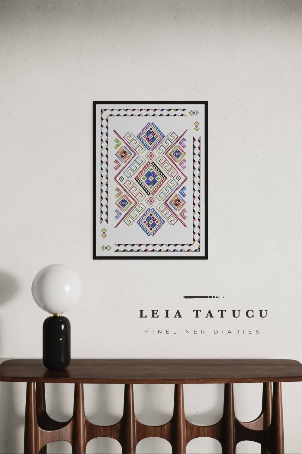 Geometric motif pattern artwork from Romanian traditional apron displayed on a wall above mid-century modern furniture.