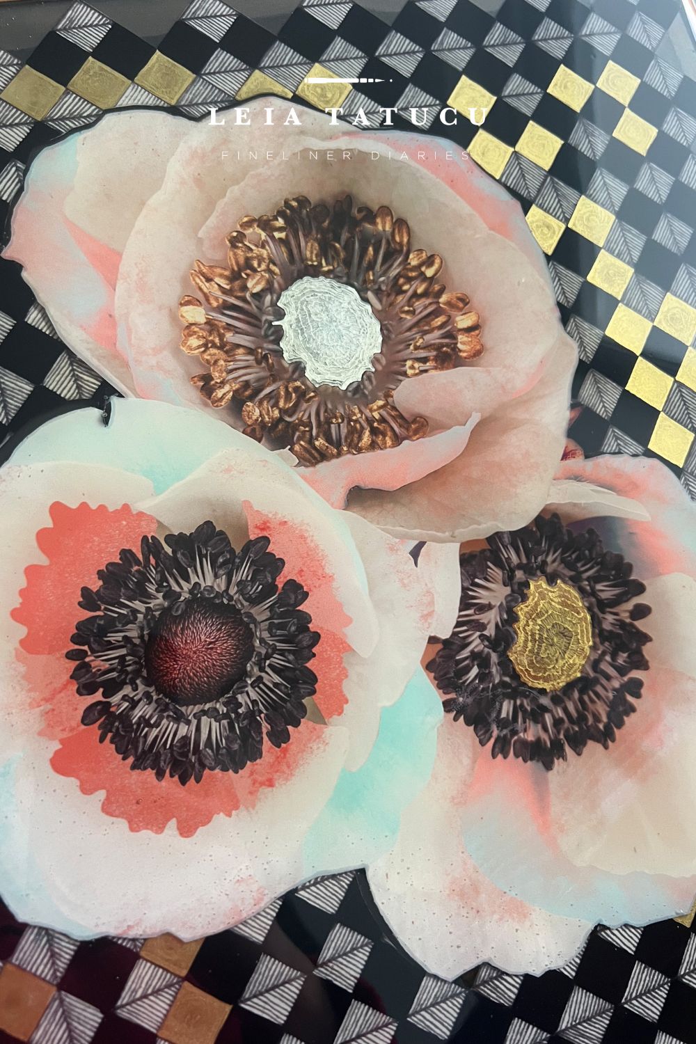 Detail shot with three flowers of the Anemone and Geometrics resin mixed media original art piece.